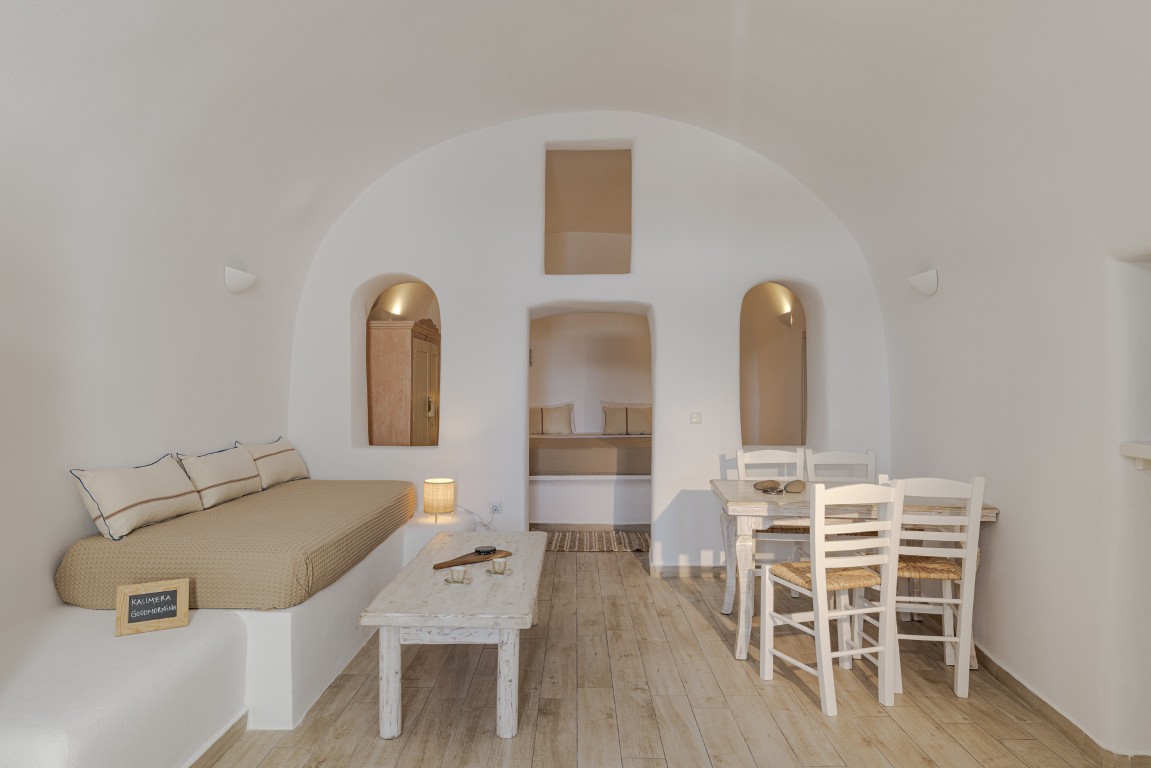 Dining area and kitchenette inside Earth Cave House