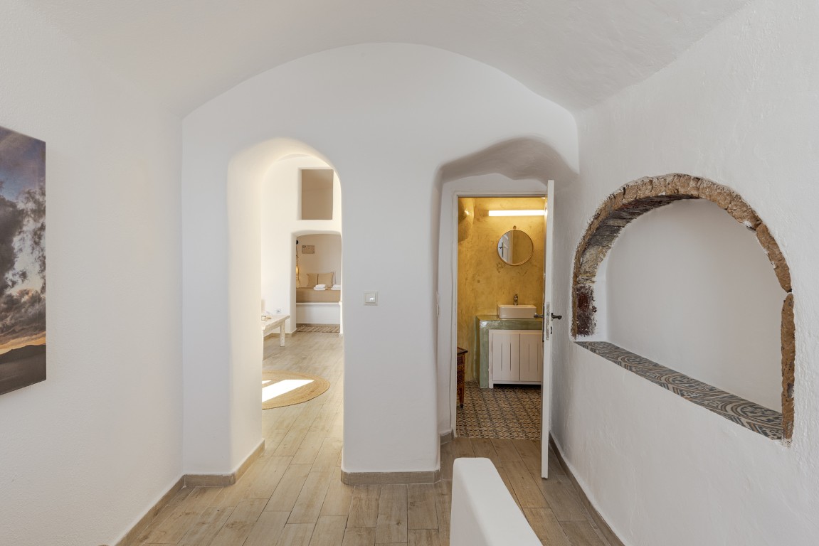 Cycladic cave-style living area in Earth Cave House