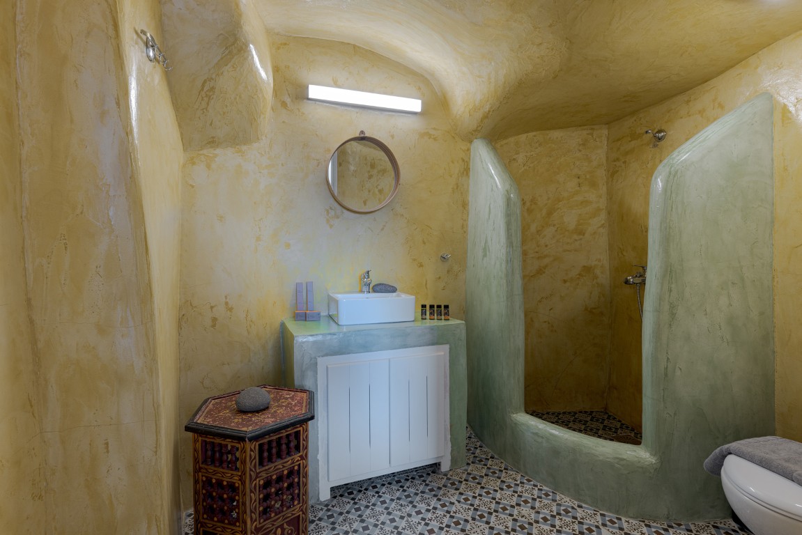 Cycladic cave-style living area in Earth Cave House