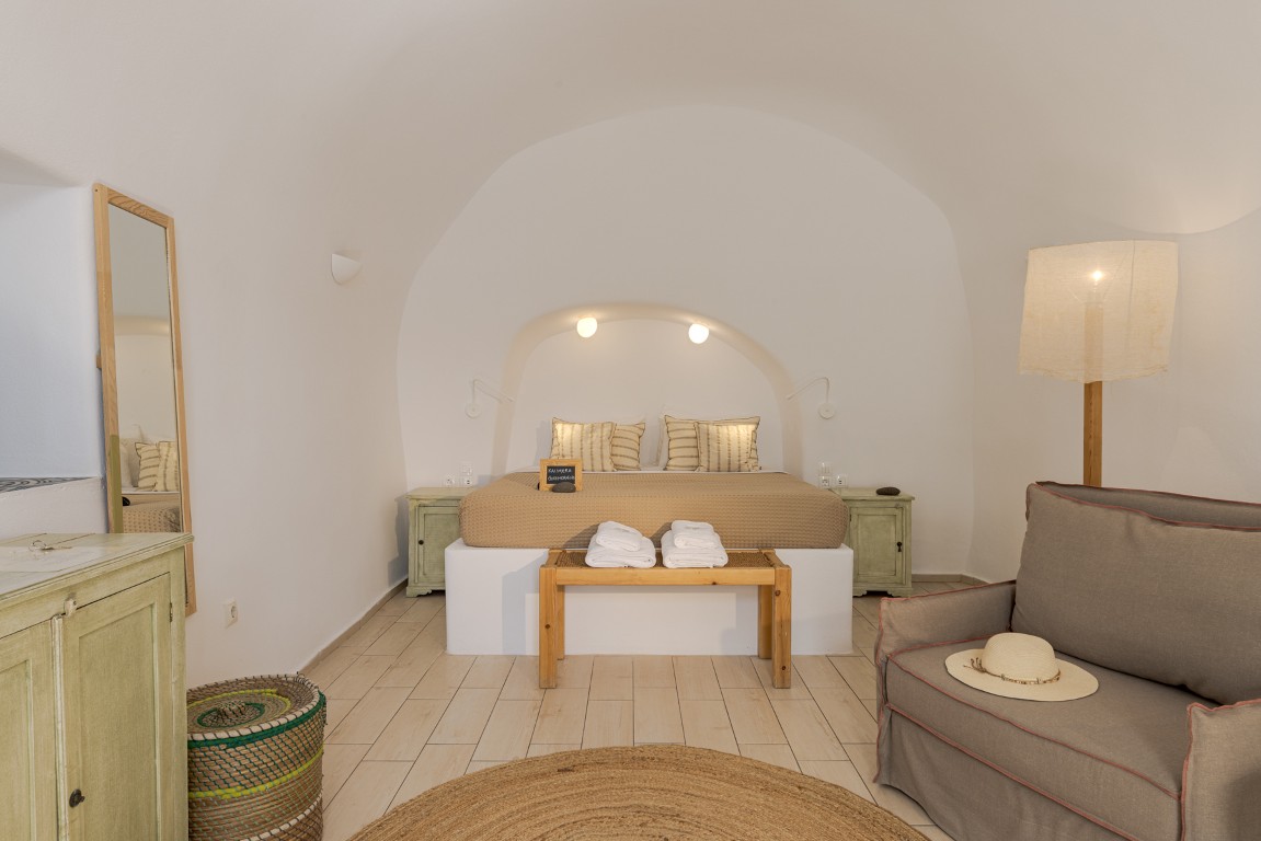 Wind House private terrace with sunset caldera view in Oia