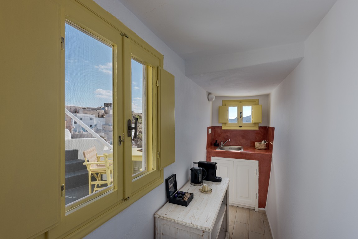 Wind House private terrace with sunset caldera view in Oia