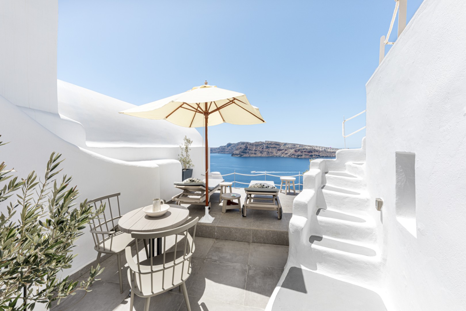 Interior of Yposkafo Jacuzzi House — Cycladic living space in Santorini