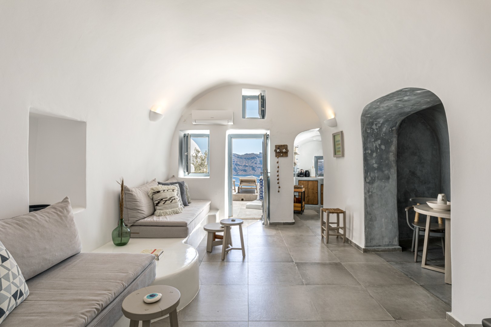 Interior of Yposkafo Jacuzzi House — Cycladic living space in Santorini